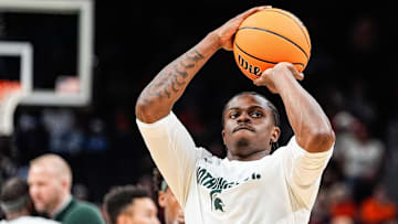 Michigan State forward Coen Carr (55) warms up before the tipoff of the Elite Eight round of NCAA tournament against Auburn at State Farm Arena in Atlanta, Ga. on Sunday, March 30, 2025.