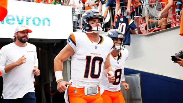 Denver Broncos quarterback Bo Nix (10) and quarterback Jarrett Stidham (8) before the preseason game against the Green Bay Pa