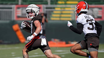 Cleveland Browns wide receiver Luke Floriea (37) gets away from cornerback Chigozie Anusiem (35) during NFL training camp practice at the Cleveland Browns training facility, Wednesday, July 23, 2025, in Berea, Ohio.
