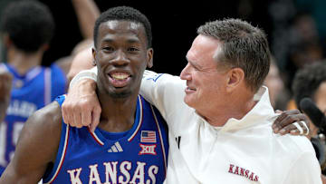Kansas basketball guard Melvin Council Jr and head coach Bill Self