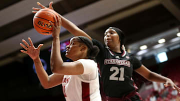 Feb 25, 2024; Tuscaloosa, Alabama, USA; Alabama forward Essence Cody (21) shoots inside with defense by Mississippi State guard Debreasha Powe (21) at Coleman Coliseum Sunday.