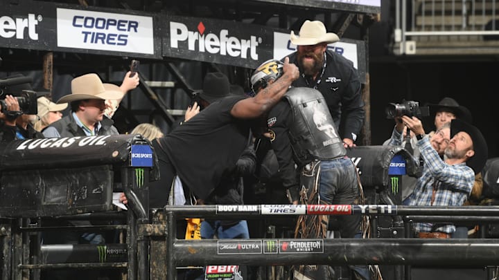 Brett Keisel seen on the back of the chutes cheering on cowboys. Brett Keisel seen on the back of the chutes cheering on cowboys.
