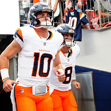 Aug 18, 2024; Denver, Colorado, USA; Denver Broncos quarterback Bo Nix (10) and quarterback Jarrett Stidham (8) before the preseason game against the Green Bay Packers at Empower Field at Mile High. 