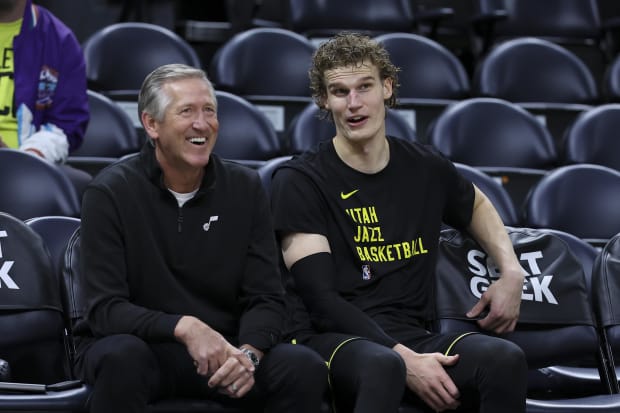 Utah Jazz forward Lauri Markkanen (23) speaks with shooting coach Jeff Hornacek before the game against the Atlanta Hawks. 