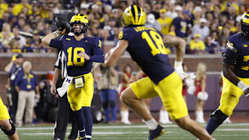 Aug 31, 2024; Ann Arbor, Michigan, USA;  Michigan Wolverines quarterback Davis Warren (16) throws the ball against the Fresno State Bulldogs in the first half at Michigan Stadium. Mandatory Credit: Rick Osentoski-USA TODAY Sports