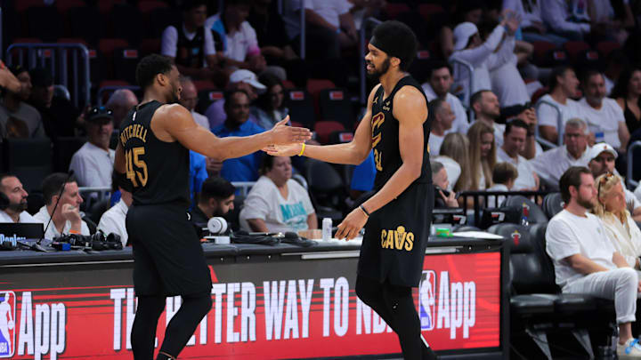 Apr 26, 2025; Miami, Florida, USA; Cleveland Cavaliers center Jarrett Allen (31) high-fives guard Donovan Mitchell (45) in the fourth quarter against the Miami Heat during game three for the first round of the 2025 NBA Playoffs at Kaseya Center. Mandatory Credit: Sam Navarro-Imagn Images Apr 26, 2025; Miami, Florida, USA; Cleveland Cavaliers center Jarrett Allen (31) high-fives guard Donovan Mitchell (45) in the fourth quarter against the Miami Heat during game three for the first round of the 2025 NBA Playoffs at Kaseya Center. Mandatory Credit: Sam Navarro-Imagn Images