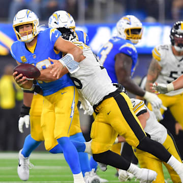 Nov 9, 2025; Inglewood, California, USA; Pittsburgh Steelers linebacker Alex Highsmith (56) sacks Los Angeles Chargers quarterback Justin Herbert (10) during the third quarter of the game at SoFi Stadium. Mandatory Credit: Gary A. Vasquez-Imagn Images