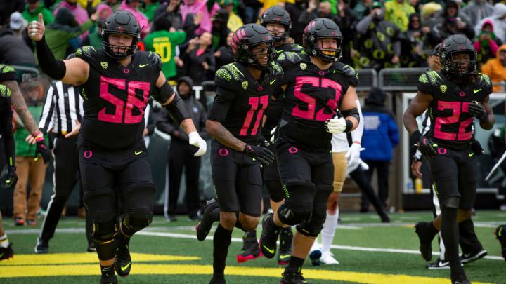 Oregon players celebrate a touchdown as the Oregon Ducks take on the UCLA Bruins Saturday, Oct. 22, 2022, at Autzen Stadium in Eugene, Ore.