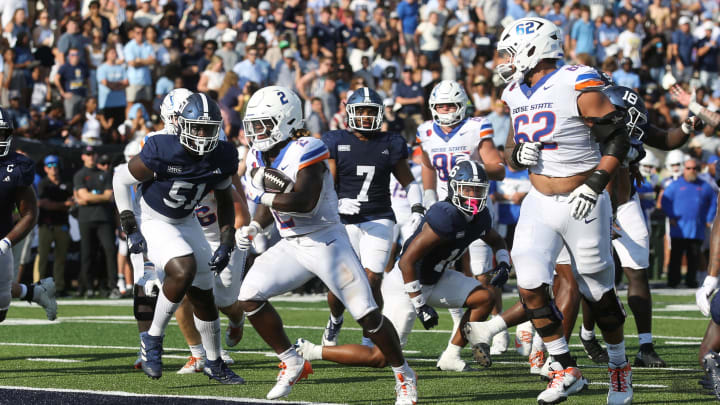 Aug 31, 2024; Statesboro, Georgia, USA; Boise State Broncos running back Ashton Jeanty (2) scores a touchdown against the Georgia Southern Eagles at Paulson Stadium. Mandatory Credit: Richard Burkhart/Savannah Morning News-USA TODAY Sports