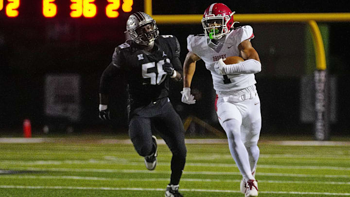 Brophy wide receiver sprints down the field for a 64-yard touchdown against Hamilton during a game at Hamilton High School in Chandler, on Sept. 19, 2025. Brophy wide receiver sprints down the field for a 64-yard touchdown against Hamilton during a game at Hamilton High School in Chandler, on Sept. 19, 2025.