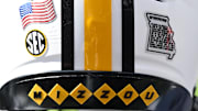 Oct 5, 2024; College Station, Texas, USA; A detail view of a Missouri Tigers helmet on the side line in the first quarter against the Texas A&M Aggies at Kyle Field. Mandatory Credit: Maria Lysaker-Imagn Images. 