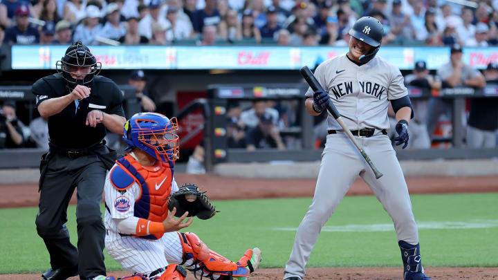 Jun 25, 2024; New York City, New York, USA; New York Yankees first baseman J.D. Davis (38) reacts after striking out to end the top of the first inning against the New York Mets at Citi Field. Mandatory Credit: Brad Penner-USA TODAY Sports