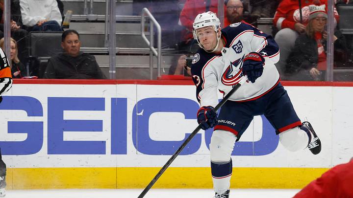 Apr 7, 2026; Detroit, Michigan, USA;  Columbus Blue Jackets center Charlie Coyle (3) takes a shot in the first period against the Detroit Red Wings at Little Caesars Arena. Mandatory Credit: Rick Osentoski-Imagn Images