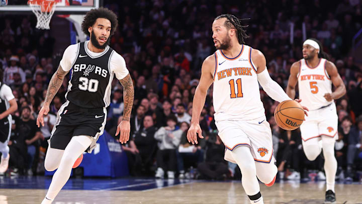 Dec 25, 2024; New York, New York, USA; New York Knicks guard Jalen Brunson (11) looks to drive past San Antonio Spurs forward Julian Champagnie (30) in the third quarter at Madison Square Garden. Mandatory Credit: Wendell Cruz-Imagn Images Dec 25, 2024; New York, New York, USA; New York Knicks guard Jalen Brunson (11) looks to drive past San Antonio Spurs forward Julian Champagnie (30) in the third quarter at Madison Square Garden. Mandatory Credit: Wendell Cruz-Imagn Images