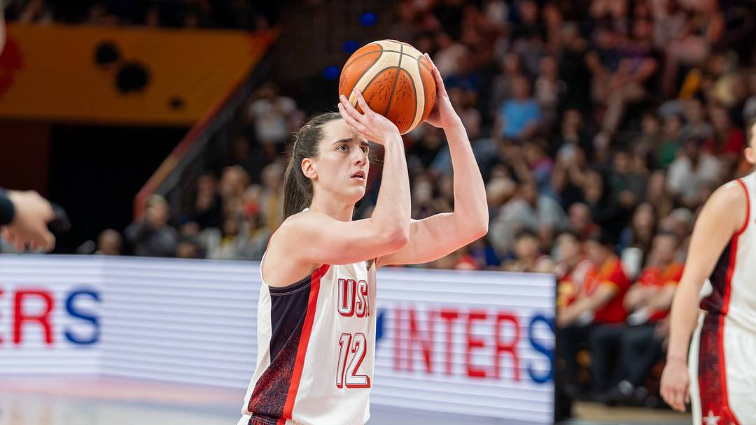Caitlin Clark prepares to shoot a free throw during a FIBA World Cup game.
