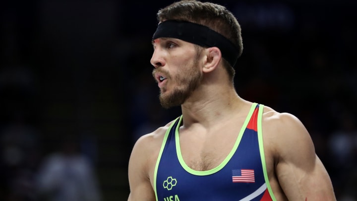 Zain Retherford walks onto  the mat for a 65 kg freestyle match at the 2024 U.S. Olympic Wrestling Team Trials. 