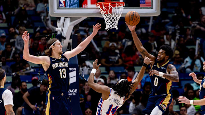 Former Husky Keion Brooks Jr. (0) grabs a rebound for the New Orleans Pelicans.