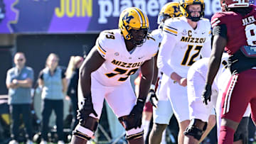 Oct 12, 2024; Amherst, Massachusetts, USA; Missouri Tigers offensive lineman Armand Membou (79) lines up against the Massachusetts Minutemen during the first half at Warren McGuirk Alumni Stadium. Mandatory Credit: Eric Canha-Imagn Images