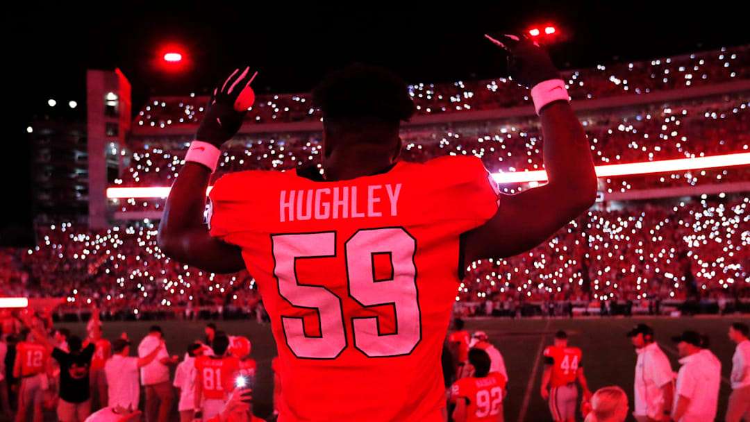 Georgia offensive lineman Bo Hughley (59) celebrates as Sanford Stadium is turned red as the game goes into the fourth during the second half of a NCAA college football game against UAB in Athens, Ga., on Saturday, Sept. 23, 2023. Georgia offensive lineman Bo Hughley (59) celebrates as Sanford Stadium is turned red as the game goes into the fourth during the second half of a NCAA college football game against UAB in Athens, Ga., on Saturday, Sept. 23, 2023.
