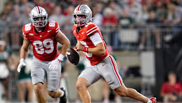 Ohio State Buckeyes quarterback Julian Sayin (10) scrambles in front of tight end Will Kacmarek (89) during the NCAA football game against the Ohio Bobcats at Ohio Stadium on Sept. 13, 2025. Ohio State won 37-9.