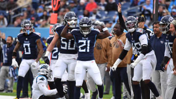 Nov 26, 2023; Nashville, Tennessee, USA; Tennessee Titans cornerback Roger McCreary (21) celebrates after a defensive stop during the second half against the Carolina Panthers at Nissan Stadium. Mandatory Credit: Christopher Hanewinckel-USA TODAY Sports