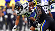 Nov 16, 2025; Inglewood, California, USA; Seattle Seahawks running back Kenneth Walker III (9) runs the ball during the second half against the Seattle Seahawks at SoFi Stadium. Mandatory Credit: Gary A. Vasquez-Imagn Images