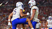 Aug 26, 2023; Los Angeles, California, USA; San Jose State Spartans wide receiver Nick Nash (3) celebrates his touchdown scored against the Southern California Trojans with wide receiver Matthew Coleman (15) during the second half at Los Angeles Memorial Coliseum. Mandatory Credit: Gary A. Vasquez-Imagn Images