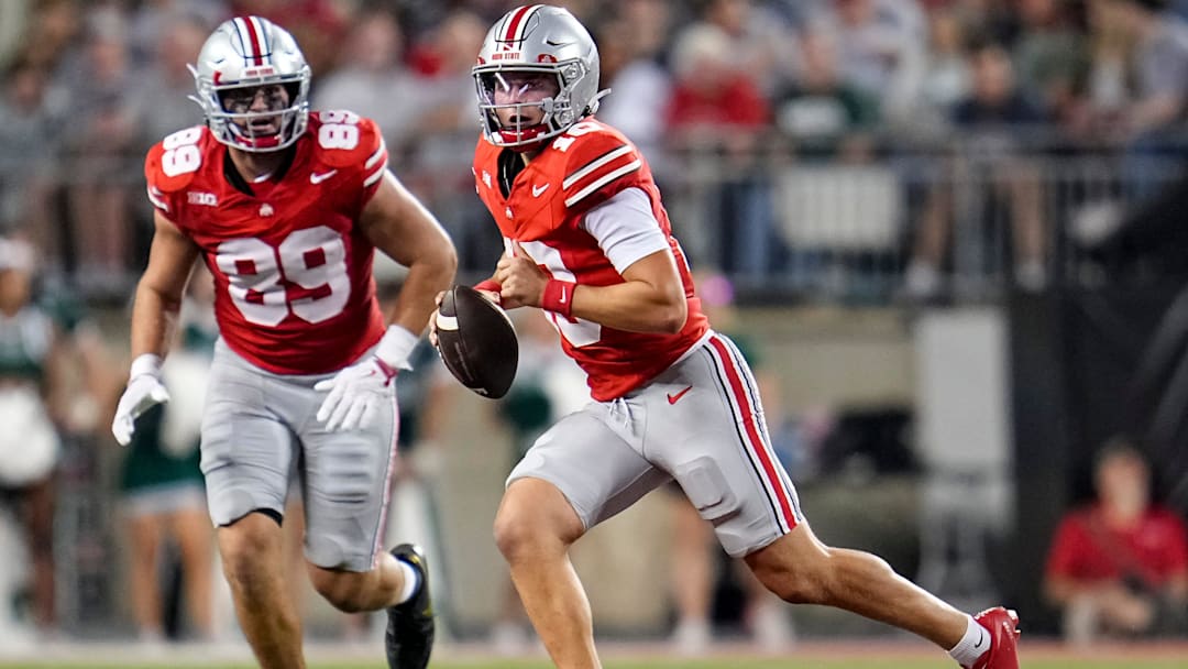 Ohio State Buckeyes quarterback Julian Sayin (10) scrambles in front of tight end Will Kacmarek (89) during the NCAA football game against the Ohio Bobcats at Ohio Stadium on Sept. 13, 2025. Ohio State won 37-9.