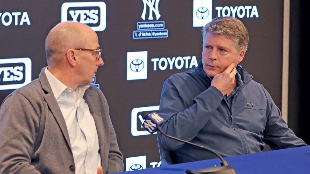 New York Yankees' Brian Cashman and Hal Steinbrenner...