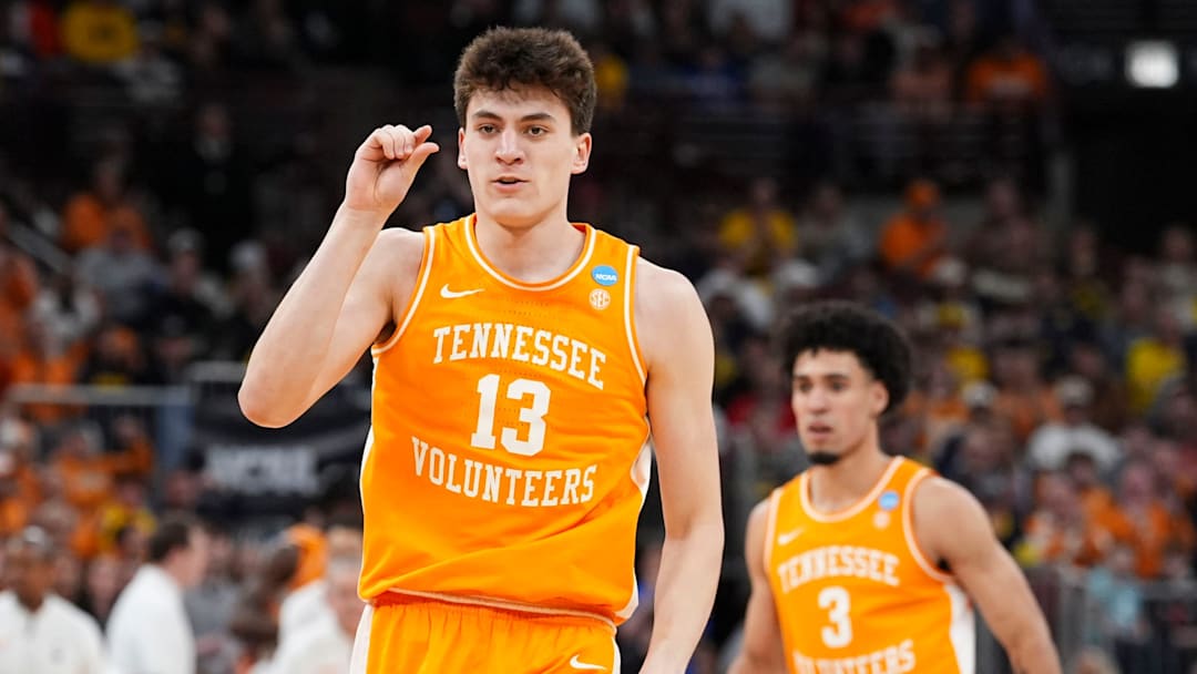 Tennessee forward J.P. Estrella (13) signals a close shot during the NCAA Tournament Elite 8 game against Michigan at the United Center in Chicago on March 29, 2026.