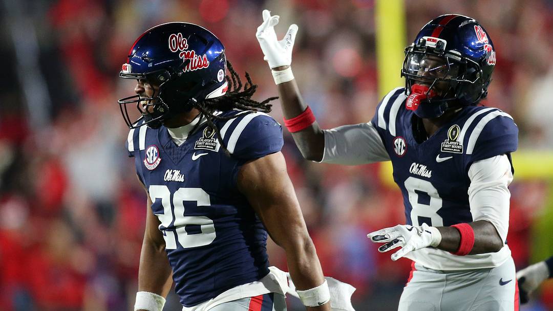 Dec 20, 2025; Oxford, MS, USA; Mississippi Rebels linebacker Tahj Chambers (26) and defensive back Antonio Kite (8) react during the fourth quarter against the Tulane Green Wave at Vaught-Hemingway Stadium. Mandatory Credit: Petre Thomas-Imagn Images Dec 20, 2025; Oxford, MS, USA; Mississippi Rebels linebacker Tahj Chambers (26) and defensive back Antonio Kite (8) react during the fourth quarter against the Tulane Green Wave at Vaught-Hemingway Stadium. Mandatory Credit: Petre Thomas-Imagn Images