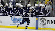 Penn State hockey players celebrate a goal vs. Michigan in the Big Ten hockey tournament.