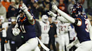 Nov 29, 2025; Charlottesville, Virginia, USA; Virginia Cavaliers linebacker Maddox Marcellus (11) celebrates after intercepting a pass against the Virginia Tech Hokies in the first quarter at Scott Stadium. Mandatory Credit: Geoff Burke-Imagn Images