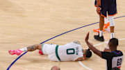 May 12, 2025; New York, New York, USA; Boston Celtics forward Jayson Tatum (0) reacts on the court after an injury in the second half during game four of the second round for the 2025 NBA Playoffs against the New York Knicks at Madison Square Garden. Tatum would leave the game with an injury after this play. Mandatory Credit: Vincent Carchietta-Imagn Images