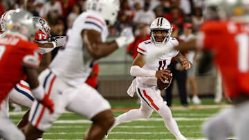Aug 31, 2024; Tucson, Arizona, USA; Arizona Wildcats quarterback Noah Fifita (11) looks for an opening to pass the ball during fourth quarter at Arizona Stadium. Mandatory Credit: Aryanna Frank-Imagn Images