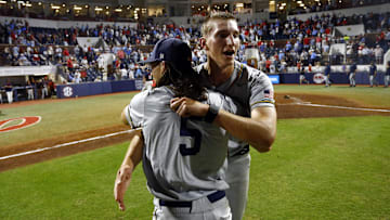 Jun 2, 2025; Oxford, MS, USA; Murray State Racers relief pitcher Graham Kelham (41) reacts with pitcher Harper McLendon (5) after defeating the Mississippi Rebels in the Oxford Regional. Mandatory Credit: Petre Thomas-Imagn Images