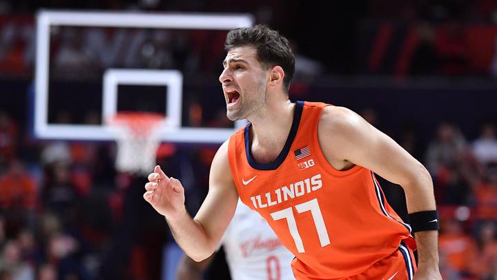 Nov 24, 2025; Champaign, Illinois, USA; Illinois Fighting Illini guard Mihailo Petrovic (77) yells instructions to teammates during the second half against the UT Rio Grande Valley Vaqueros at State Farm Center. Mandatory Credit: Ron Johnson-Imagn Images