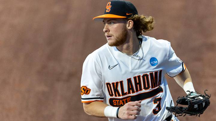 May 31, 2024; Stillwater, OK, USA; Oklahoma State utility Carson Benge (3) catches the ball in the outfield during a regional NCAA Baseball game against Niagara at O'Brate Stadium. Mandatory Credit: Mitch Alcala-For The Oklahoman
