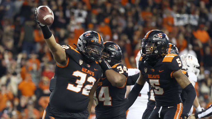 iNov 13, 2021; Corvallis, Oregon, USA; Oregon State Beavers defensive lineman Keonte Schad (32) celebrates with teammates after a fumble recovery during the second half against the Stanford Cardinal at Reser Stadium. Mandatory Credit: Soobum Im-USA TODAY Sports