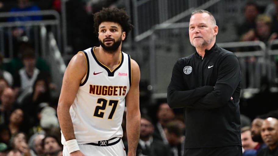 Denver Nuggets head coach Michael Malone and guard Jamal Murray look on in the fourth quarter against the Milwaukee Buck.