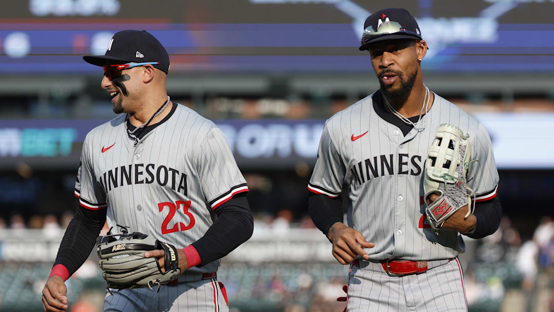 Jul 26, 2024; Detroit, Michigan, USA; Minnesota Twins outfielder Byron Buxton (25) and third baseman Royce Lewis (23) return to the dugout after the first inning of the game against the Detroit Tigers at Comerica Park. Mandatory Credit: Brian Bradshaw Sevald-Imagn Images Jul 26, 2024; Detroit, Michigan, USA; Minnesota Twins outfielder Byron Buxton (25) and third baseman Royce Lewis (23) return to the dugout after the first inning of the game against the Detroit Tigers at Comerica Park. Mandatory Credit: Brian Bradshaw Sevald-Imagn Images
