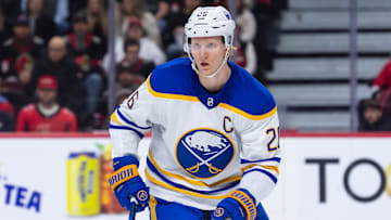 Apr 1, 2025; Ottawa, Ontario, CAN; Buffalo Sabres defenseman Rasmus Dahlin (26) follows the puck in the first period against the Ottawa Senators at the Canadian Tire Centre. Mandatory Credit: Marc DesRosiers-Imagn Images
