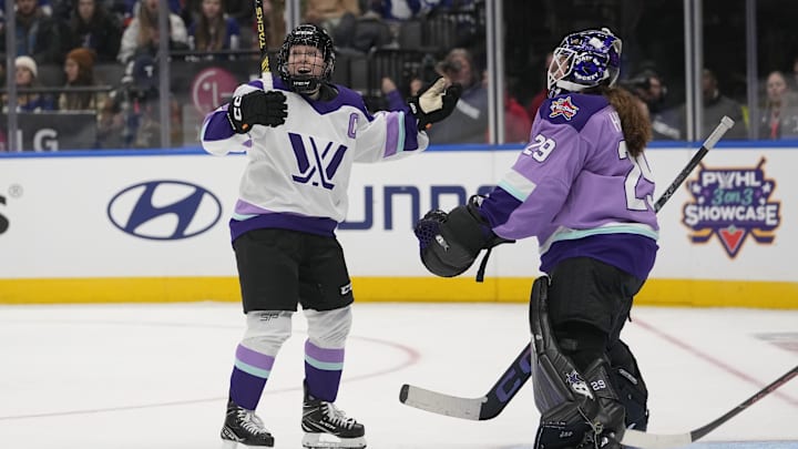 Feb 1, 2024; Toronto, Ontario, CANADA; Team King forward Kendall Coyne Schofield (26) celebrates her goal against Team Kloss goaltender Nicole Hensley (29) during the PWHL 3-on-3 Showcase during NHL All-Star Thursday at Scotiabank Arena. Mandatory Credit: John E. Sokolowski-Imagn Images