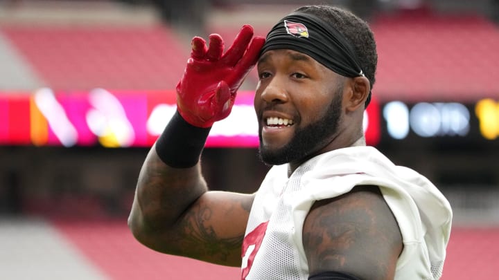 Arizona Cardinals safety Budda Baker (3) acknowledges the fans in the stands during training camp at State Farm Stadium in Glendale on July 25, 2024.