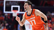 Nov 24, 2025; Champaign, Illinois, USA; Illinois Fighting Illini guard Mihailo Petrovic (77) yells instructions to teammates during the second half against the UT Rio Grande Valley Vaqueros at State Farm Center. Mandatory Credit: Ron Johnson-Imagn Images