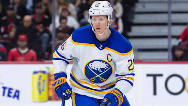 Hockey player in white uniform