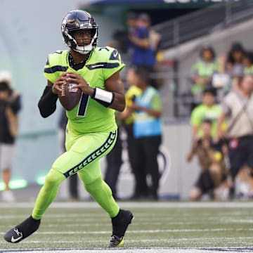 Sep 12, 2022; Seattle, Washington, USA; Seattle Seahawks quarterback Geno Smith (7) looks to pass against the Denver Broncos during the second quarter at Lumen Field. Mandatory Credit: Joe Nicholson-Imagn Images