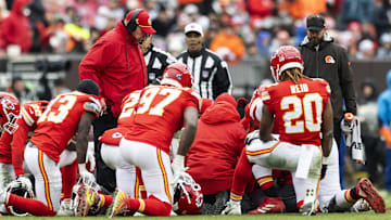 Dec 15, 2024; Cleveland, Ohio, USA; Kansas City Chiefs head coach Andy Reid watches over a player receiving medical treatment on the field during the second quarter against the Cleveland Browns at Huntington Bank Field. Mandatory Credit: Scott Galvin-Imagn Images