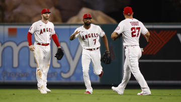 Los Angeles Angels outfielders Taylor Ward, Mike Trout, and Jo Adell