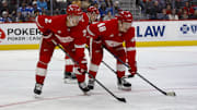 Oct 27, 2024; Detroit, Michigan, USA; Detroit Red Wings defenseman Olli Maatta (2) and right wing Jonatan Berggren (48) look on during a face off in the first period of the game at Little Caesars Arena. Mandatory Credit: Brian Bradshaw Sevald-Imagn Images